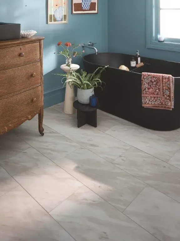 Bathroom with grey tile flooring