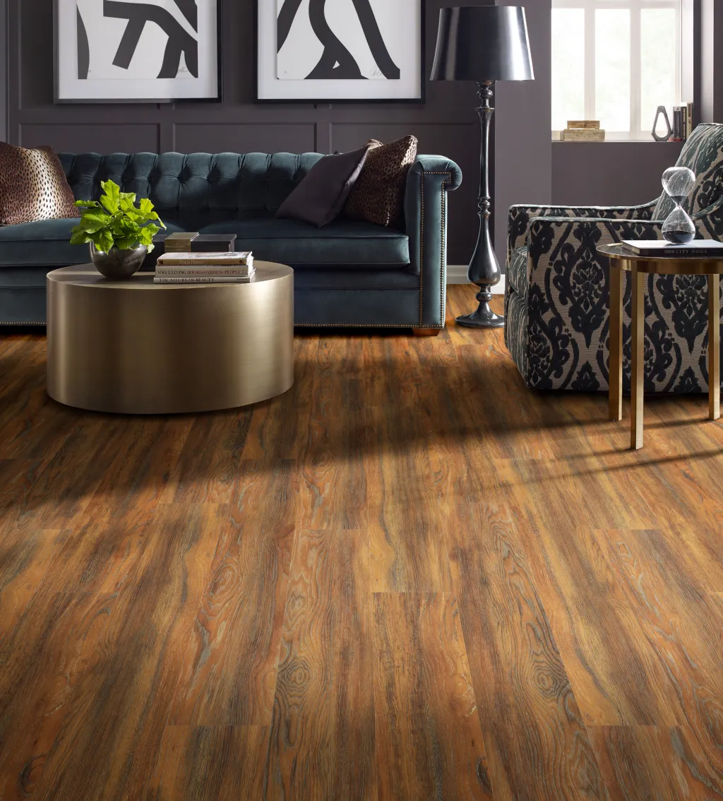 A living room with brown vinyl flooring